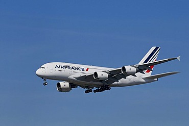 Air France passenger plane in flight with extended landing gear, Airbus A 380 super jumbo