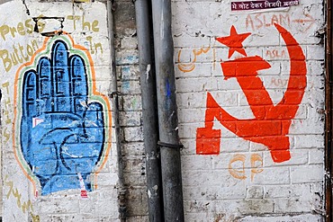 Symbols of the Indian Congress Party and the Communist party painted on a wall, Shibpur district, Howrah, Kolkata, West Bengal, India, Asia