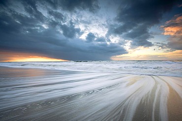 Afterglow in winter with ice and snow, Sylt island, Schleswig-Holstein, Germany, Europe