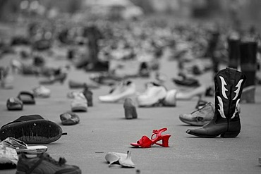 An art exhibit of thousands of shoes on the street by artist Tyree Guyton called "Street Folk" represents the issue of homelessness, part of Art X Detroit, a collection of performance art, music, and literary events held in Detroit, Michigan, USA, America