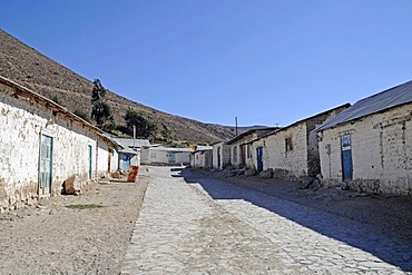 Empty, steep road, typical houses, mountain, Socoroma village, Putre, Altiplano, Norte Grande, northern Chile, Chile, South America