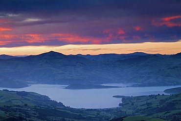 Sunset above Akaroa Harbor, Banks Peninsula, Canterbury region, South Island, New Zealand