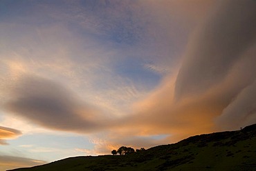 Dramatic sunset clouds near Tunnel Beach, South Island, New Zealand