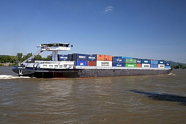 Cargo boat, container ship travelling on the Rhine River, Bonn, Rhineland region, North Rhine-Westphalia, Germany, Europe