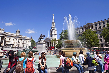 Fountain and tourists, Trafalgar Square, London, England, United Kingdom, Europe