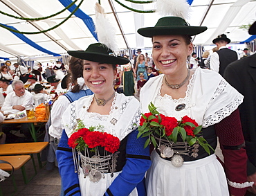 Girls in Bavarian costume, Oktoberfest, Munich, Bavaria, Germany, Europe