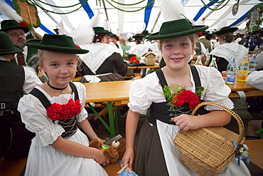 Girls in Bavarian costume, Oktoberfest, Munich, Bavaria, Germany, Europe