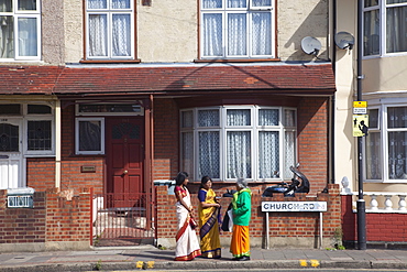 Indian women in typical London suburban street, Stratford, London, England, United Kingdom, Europe