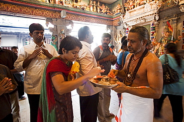 Hindu devotees in the Sri Veerama-kaliamman Temple, Little India, Singapore, Southeast Asia, Asia