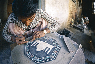 Man carving marble inlay souvenir plate of Taj Mahal, Agra, Uttar Pradesh, India, Asia