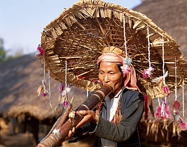 Meo hill tribe man smoking pipe, Chiang Rai, Golden Triangle, Thailand, Southeast Asia, Asia