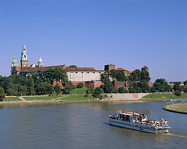 Wawel Castle, Vistula River and tour boat, Cracow (Krakow), Poland, Europe