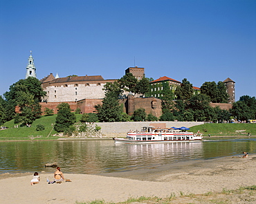 Wawel Castle, Vistula River and tour boat, Cracow (Krakow), Poland, Europe