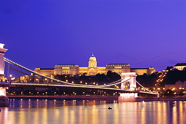 The Royal Palace in Buda and Szechenyi Chain Bridge over the River Danube River at night, Budapest, Hungary, Europe