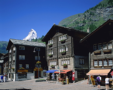 Traditional wooden buildings and Matterhorn, Zermatt, Alps, Switzerland, Europe