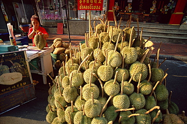 Woman street vendor selling durians, Bangkok, Thailand, Southeast Asia, Asia