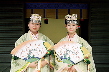 Shrine maidens dressed in traditional costume, Meiji Jingu Spring Grand Festival Celebration, Meiji Jingu Shrine, Tokyo, Japan, Asia