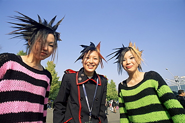 Three teenage girls, Harajuku, Tokyo, Japan, Asia