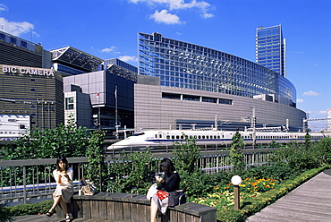 Shinkansen bullet train and city skyline, Tokyo, Honshu, Japan, Asia