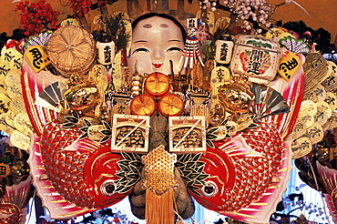 Decorative good luck rakes for sale at the Tori-no-Ichi Festival held annually in November at Otori Shrine, Tokyo, Honshu, Japan, Asia