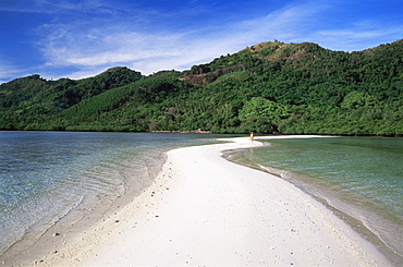 Girl walking on sand bar, Snake Island, El Nido, Bascuit Bay, Palawan, Philippines, Southeast Asia, Asia