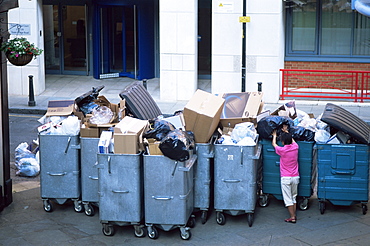 Overflowing rubbish collection bins, London, England, United Kingdom, Europe