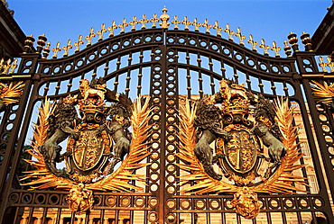 Detail of the Royal Coat of Arms on gate at Buckingham Palace, London, England, United Kingdom, Europe