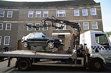 Illegally parked car being removed, London, England, United Kingdom, Europe