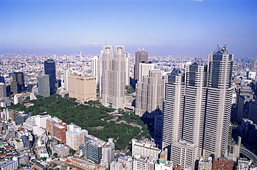 Shinjuku area skyline with Tokyo Gas Buildings and Tokyo City Hall in the foreground, Shinjuku, Tokyo, Japan, Asia