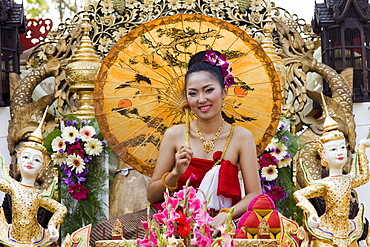 Girl on floral float at Chiang Mai Flower Festival Parade, Chiang Mai, Thailand, Southeast Asia, Asia