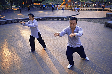 People doing Tai-chi in Lumphini Park, Bangkok, Thailand, Southeast Asia, Asia