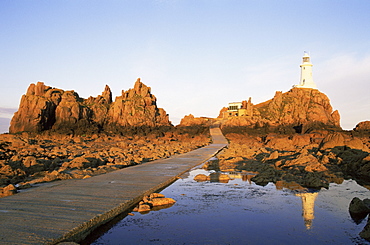 La Corbiere Lighthouse at dawn, Jersey, Channel Islands, United Kingdom, Europe