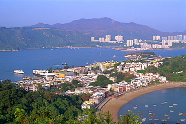 Peng Chau Island with Discovery Bay, Lantau Island in background, Hong Kong, China, Asia