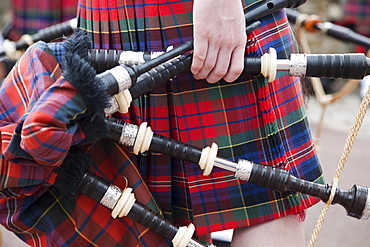 Hand holding bagpipes, The Royal Mile, Edinburgh, Scotland, United Kingdom, Europe