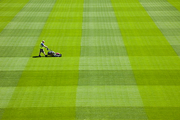 Greenkeeper mowing playing field in the Aviva Stadium in Landsdowne Road, Dublin, Republic of Ireland, Europe