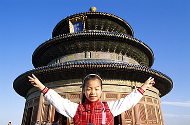 Girl posing outside the Temple of Heaven, Beijing, China, Asia