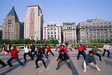 People doing Tai-chi on the Bund, Shanghai, China, Asia