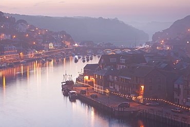 Sea fog builds over the town of Looe, Cornwall, England, United Kingdom, Europe