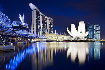 Marina Bay Sands Hotel, Lotus Flower and the Helix bridge at dusk in Singapore, Southeast Asia, Asia