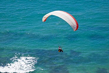 A wind glider over the coastline