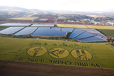 Aerial photograph of an inscription in a green field celebrating the 40th anniversary of the unification of the city of Jerusalm in 1967, Israel