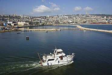 Aerial photograph of a boat in the port of Haifa, Israel