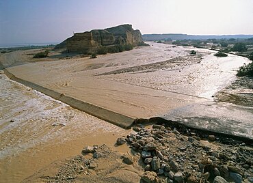 Aerial view of a flood pouring from the Judea desert to the Dead sea, Israel