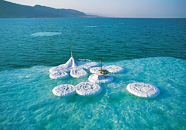 Aerial photograph of crystallized salt flouting in the southern basin of the Dead sea, Israel