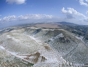 Aerial photograph of the snowy hills of Judea, Israel