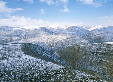 Aerial photograph of the snowy hills of Judea, Israel