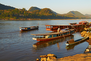 Tourist boats at sunset on the Mekong River, Luang Prabang, Laos, Indochina, Southeast Asia, Asia