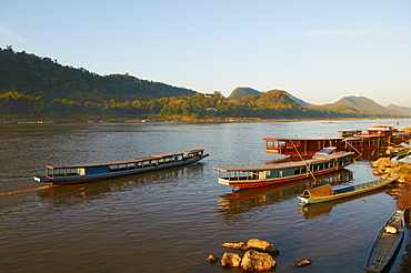 Tourist boats at sunset on the Mekong River, Luang Prabang, Laos, Indochina, Southeast Asia, Asia