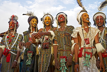 Wodaabe (Bororo) men with faces painted at the annual Gerewol male beauty contest, a general reunion of West African Wodaabe Peuls (Bororo Peul), Niger, West Africa, Africa