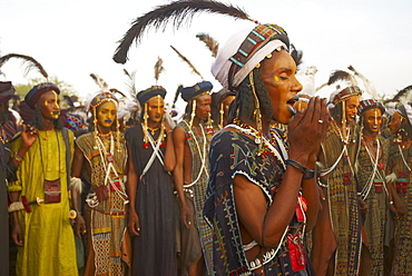 Wodaabe (Bororo) men with faces painted at the annual Gerewol male beauty contest, a general reunion of West African Wodaabe Peuls (Bororo Peul), Niger, West Africa, Africa